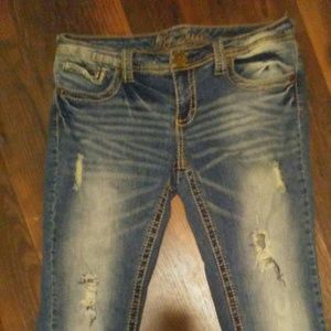 Ariya Ripped Flare Jeans